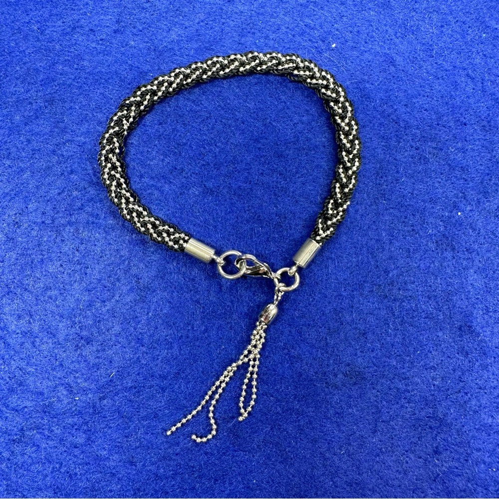 Boho Braided Silver tone and black bracelet with tassel.